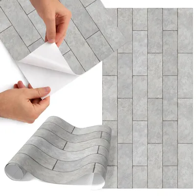 Produktbild von Möbelfolie 50x100 cm - Klebefolie Möbel - Selbstklebende Folie - Folie für Möbel - Möbelfolie Küche - Klebefolie Küche - Möbelfolie Schrank - Wasserdicht - Abwaschbar - Selbstklebend - Luftblasenfrei - Rückstandslos entfernbar - Graue Fliesen