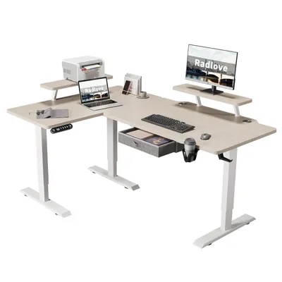 An L-shaped standing desk with office equipment.
