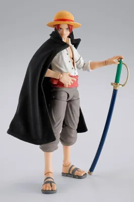 A full-body shot of an action figure of Shanks from One Piece, standing and holding a sword.