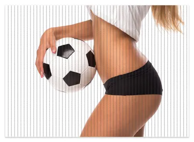 Produktbild von Wallario Duschmatte Antirutschmatte Badmatte Fußmatte Fußball - sexy Frau mit einem Fußball, Größe ca. 70 x 50 cm