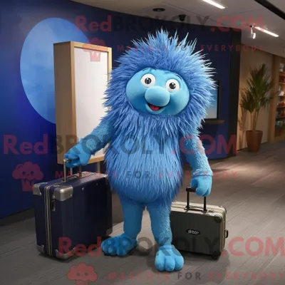 Immagine prodotto di Personaggio mascotte REDBROKOLY un Porcospino Blu vestito con body e valigetta