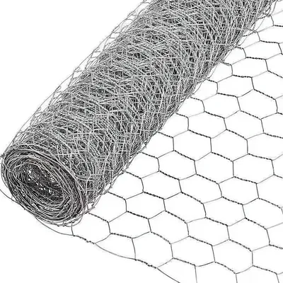 A roll of hexagonal wire mesh, also known as chicken wire or hardware cloth, is shown partially unrolled.