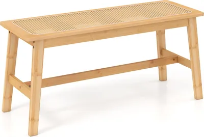 A wooden bench with a rattan seat on a white background.