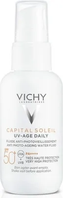 A white bottle of Vichy Capital Soleil UV-Age Daily SPF 50+ sunscreen.