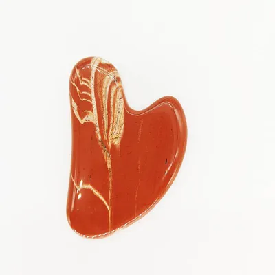 Imagen del producto de Guasha de jadeíta roja de Venoc para el masaje facial y del cuello