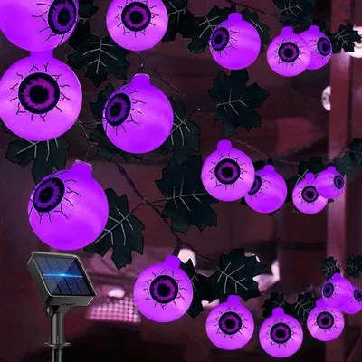 Obrázek produktu pro Solární, vodotěsné halloweenské osvětlení o délce 65 metrů s 30 LED očima.