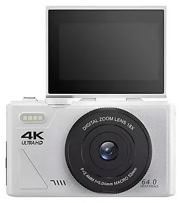 A white digital camera with its screen flipped up, shown against a white background.