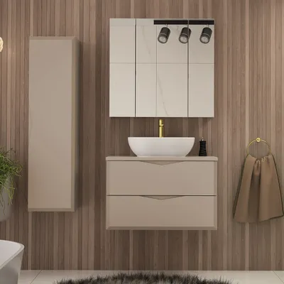 A modern bathroom vanity set with a sink, mirror cabinet, and tall cabinet against a wood-paneled wall.