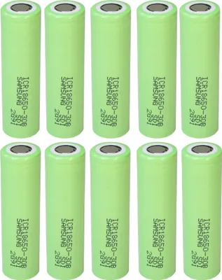 Ten green cylindrical batteries are arranged in two rows of five on a white background.