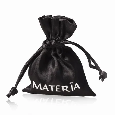 A black drawstring pouch with the brand name 'MATERIA' printed in white.