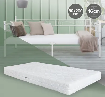 A split image showing a white metal daybed with pillows and a blanket in the upper section, and a white mattress in the lower section.