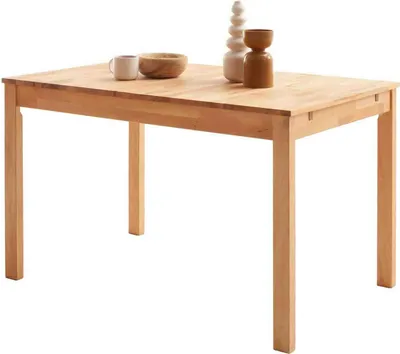 A wooden dining table with decorative items on top, set against a white background.