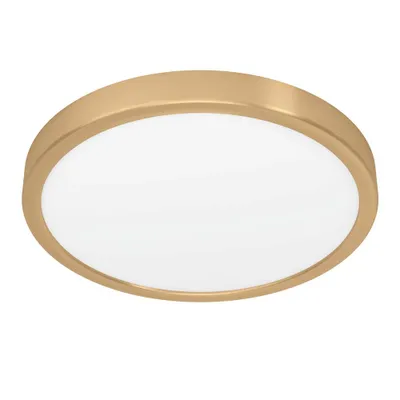 A close-up, studio shot of a round, flush-mount ceiling light with a brushed gold metal frame and a white diffuser.