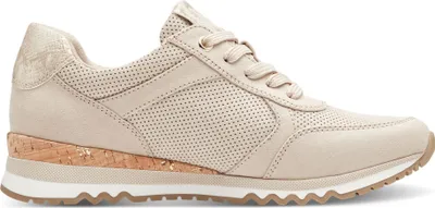 A side view of a beige sneaker with a cork-like wedge sole and gold accents.