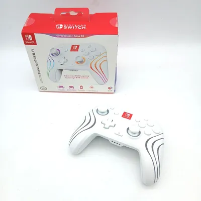 Produktbild von PDP Afterglow Wave, Gamepad, Nintendo Switch, Nintendo Switch Lite, Nintendo Switch OLED, Schaltfläche Zurück, D-Pad, Menü-Taste, Schaltfläche Teilen, Analog / Digital, Mehrfarbig, Verkabelt & Kabellos