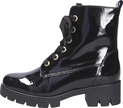 A black patent leather boot with laces and a thick sole, shown from the side against a white background.