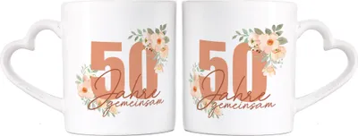 Produktbild von 2er Set Tassen mit Henkel in Herzform und Motiven für Paare (Goldene Hochzeit)