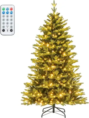 A Christmas tree with lights and a remote control.