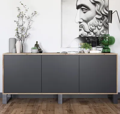 A modern sideboard with dark gray doors and a wood-toned top, displayed in a minimalist setting with decorative items.