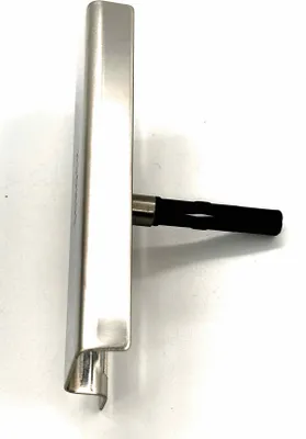 A product shot of a sink overflow cover.
