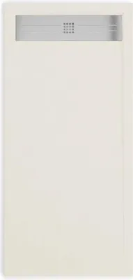 A top-down view of a flat, beige shower tray with a gray drain cover.