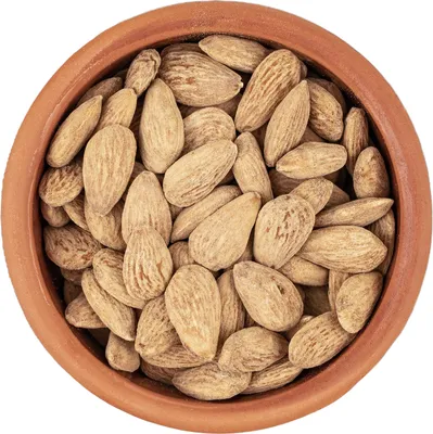 A top-down view of a bowl filled with almonds.