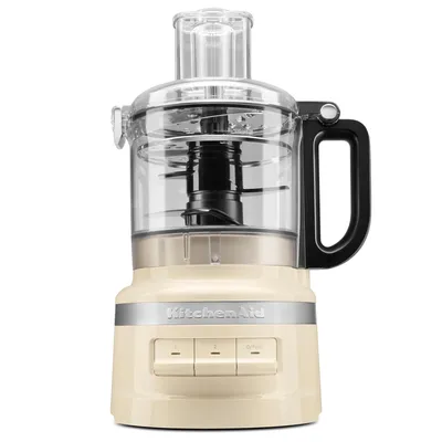 A cream-colored KitchenAid food processor is shown against a white background.