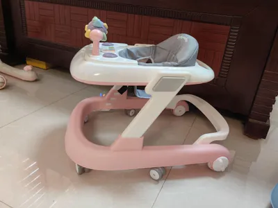 Produktbild von 2 in 1 Lauflernhilfe Babywalker Spiel- und Lauflernwagen Gehfrei Babywippe mit Musik,Spielecenter,Klappbar Laufhilfe babys ab 6 Monaten Rosa