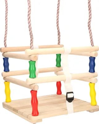 A wooden swing for children, suspended by ropes, with colorful accents.