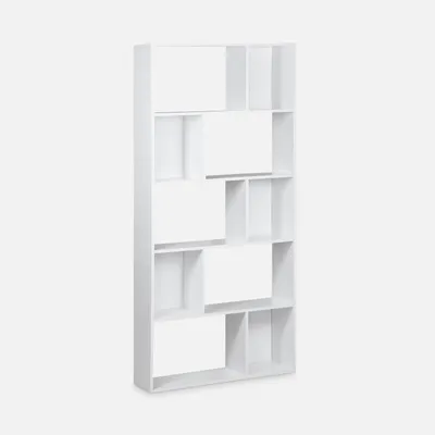 A white bookshelf with multiple compartments against a white background.