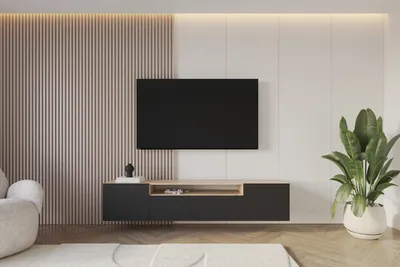 A modern living room with a wall-mounted TV and a floating media console.