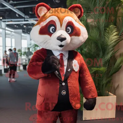 Produktbild von Maskottchencharakter REDBROKOLY eines cremefarbenen Roten Pandas mit Anzug und Ringen