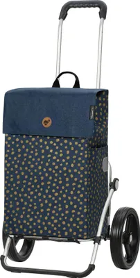 A shopping trolley with a blue patterned bag and silver frame.