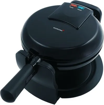 A black Korona waffle maker is shown from a slightly elevated angle against a white background.