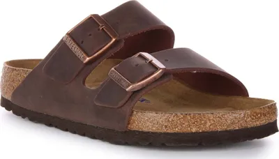 A single brown Birkenstock sandal is shown against a white background.