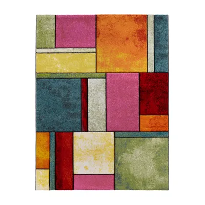 A flat lay of a colorful geometric rug on a white background.
