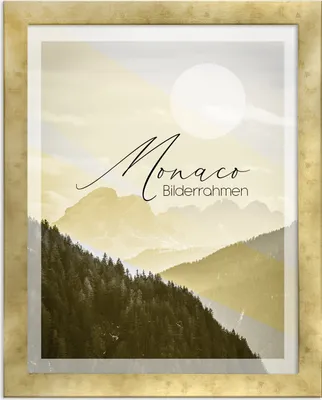 A framed picture of a mountain landscape with text overlay.
