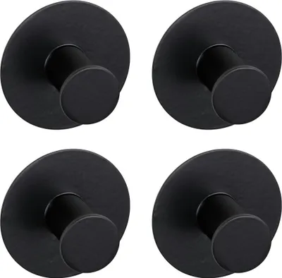 Four black wall hooks arranged in a grid.