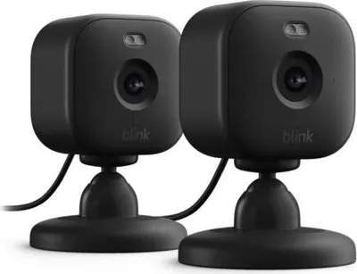 Produktbild von Amazon Blink Mini 2, IP-Sicherheitskamera, Innen & Außen, Kabellos, Amazon Alexa, Tisch/Wand, Schwarz