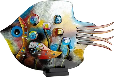 A decorative glass fish sculpture on a black stand against a white background.