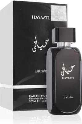 A black bottle of Lattafa Hayaati Eau de Parfum for men, displayed next to its black and white packaging.