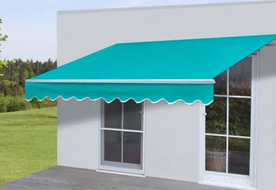 A turquoise awning is installed above two windows on the exterior of a white building.