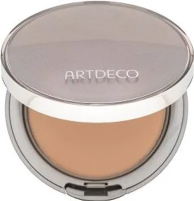 A compact foundation is shown with its lid open.