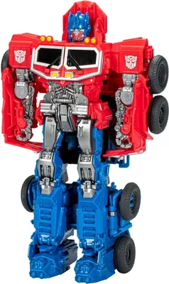 A toy robot, Optimus Prime, standing upright against a white background.