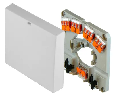 A white electrical junction box with orange WAGO connectors attached to a gray mounting plate, shown with the cover removed.