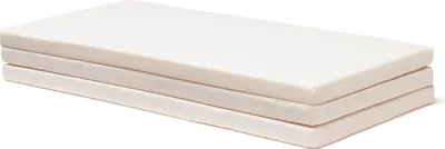 A folded beige play mat is shown on a white background.