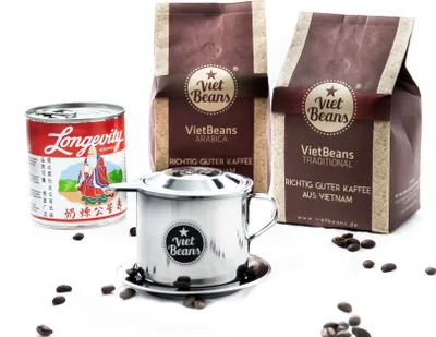 Produktbild von Vietnamesisches Kaffee-Starterset VietBeans gemahlen - 2 x 250g gemahlener Röstkaffee + Filter (Phin) + gez. Kondensmilch