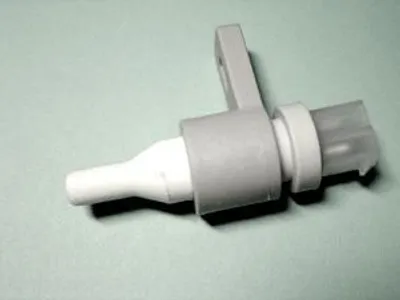 A close-up studio shot of a sensor component.