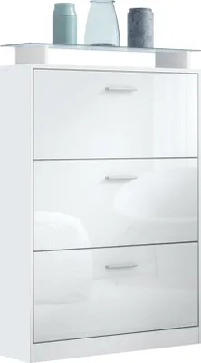 A white shoe cabinet with three drawers and a glass shelf on top, decorated with three vases.