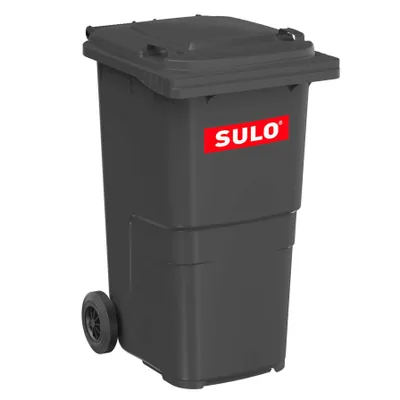 A dark gray trash bin with wheels and a lid, featuring a red SULO logo on the side.